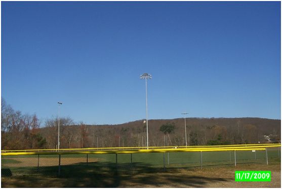 Osprey nest over third base on baseball field