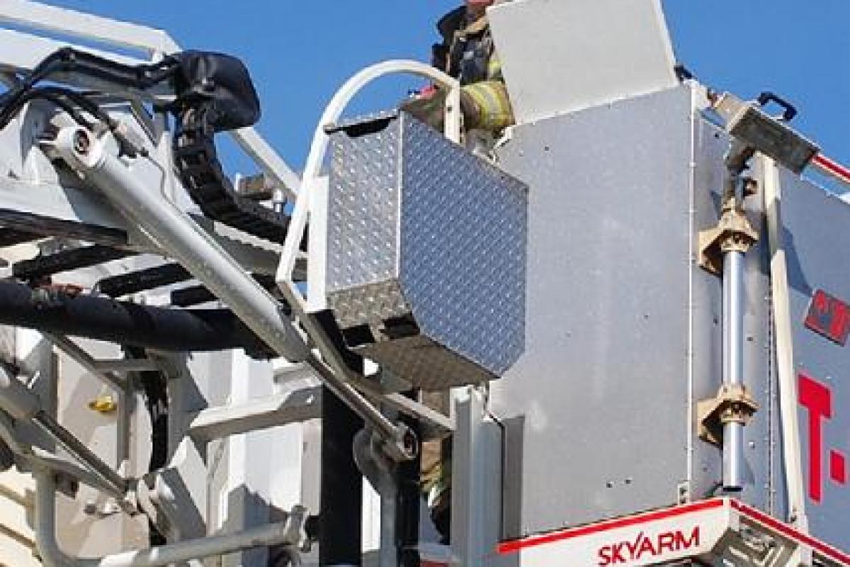 Firefighter Operating a Ladder Vehicle
