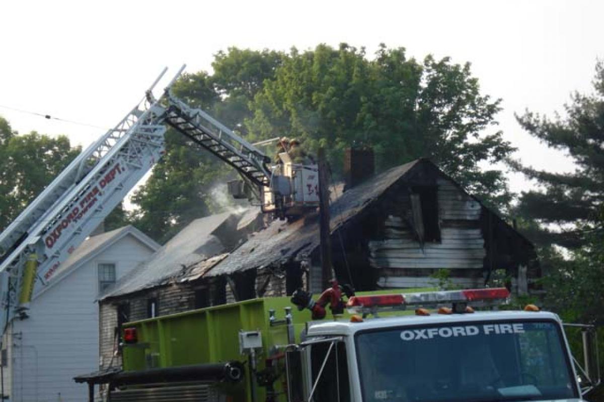 Fire Ladder Seen over the Structure Fire