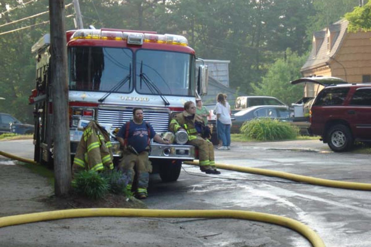 Firefighters Hanging out After the Fire Was Extinguished