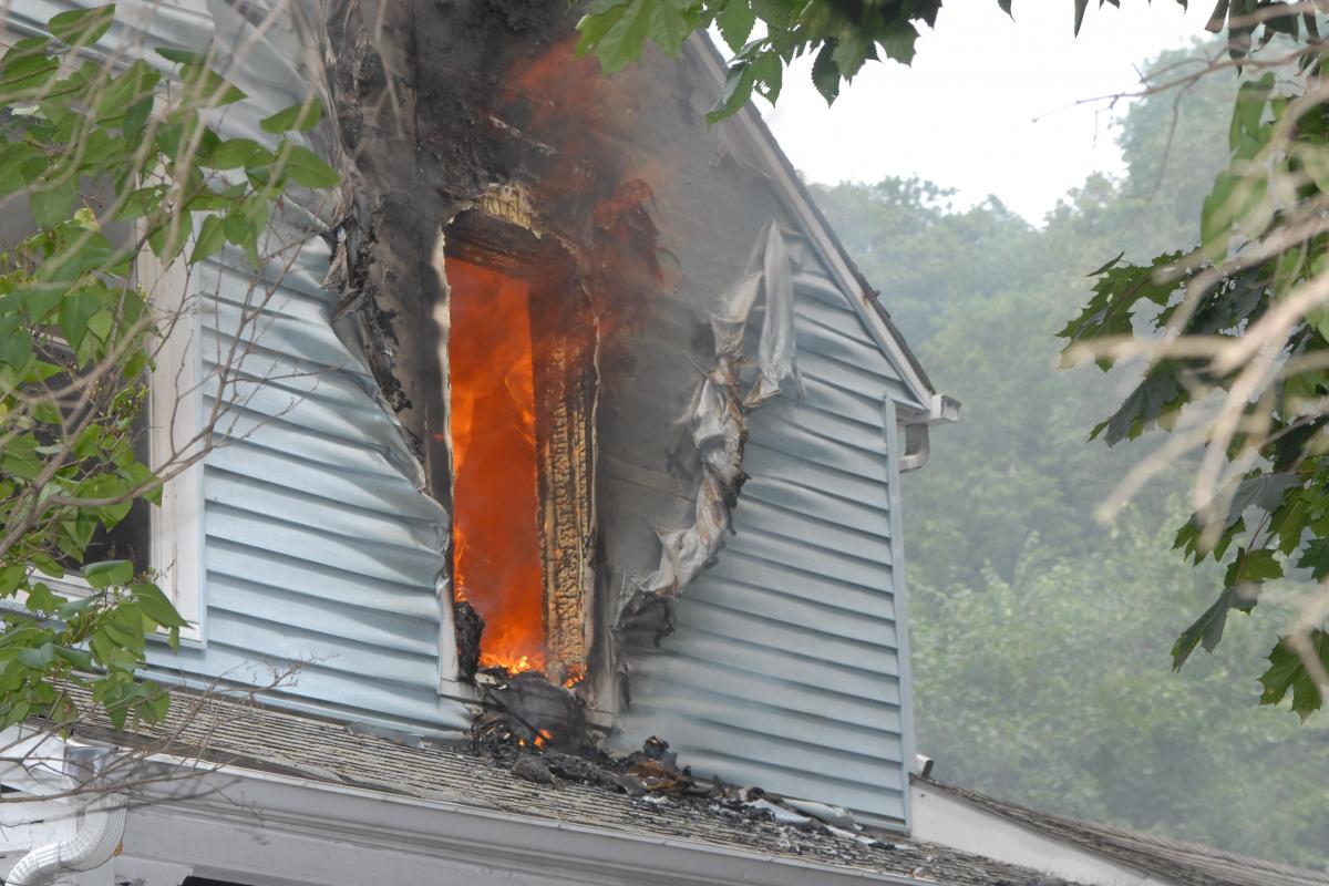 Fire Seen Blazing Inside a Home Through a Window