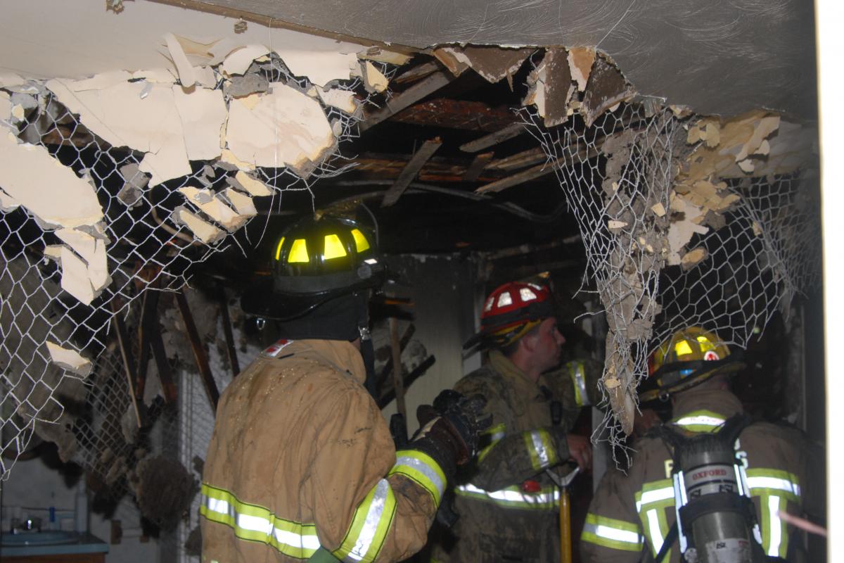 Fire Trainees Inside a Destroyed Building