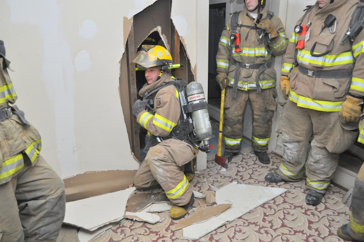 Trainees Clipping Onto a Pulley System 3