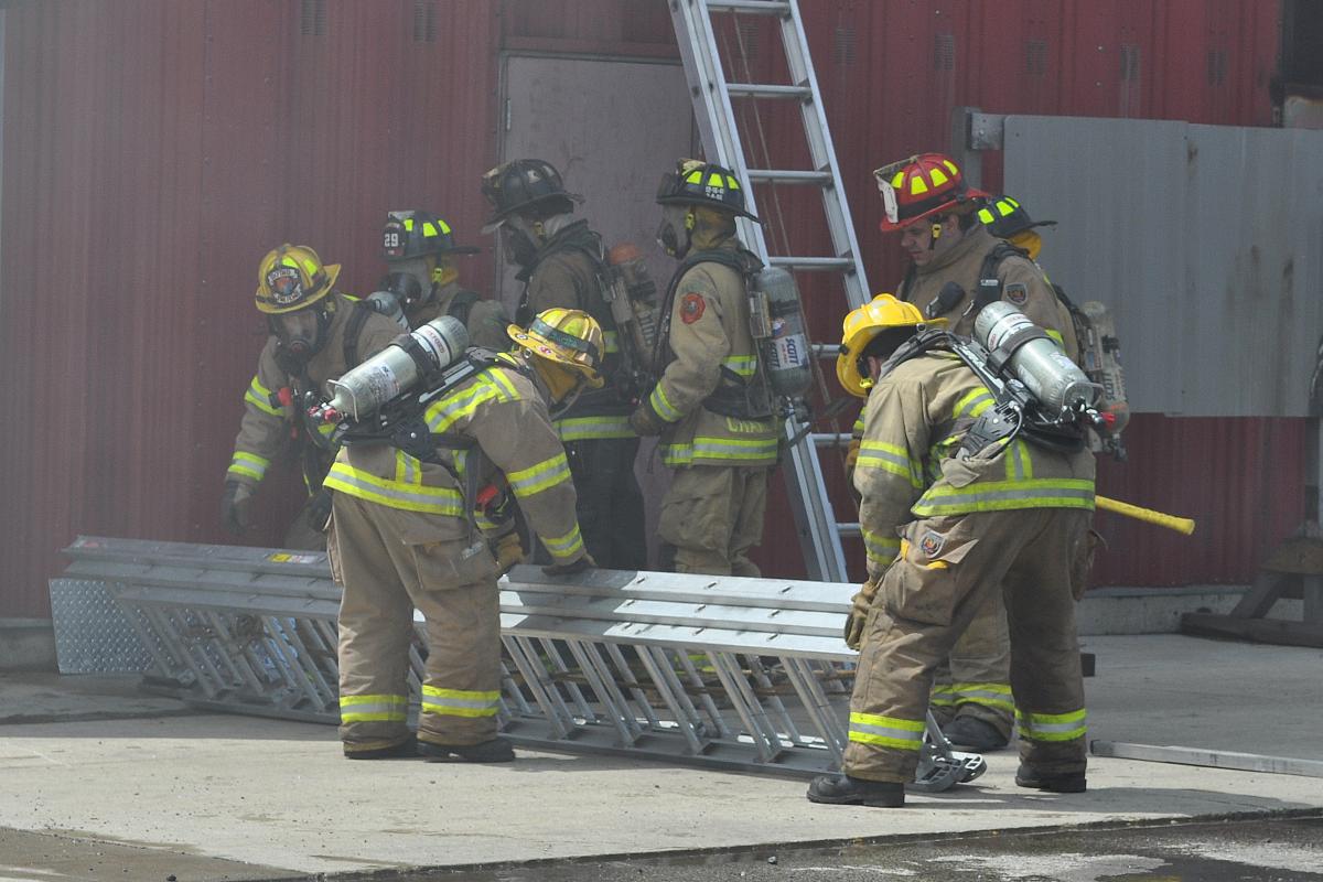 Crew of Four Trainees Under Roger Taking a Group Picture