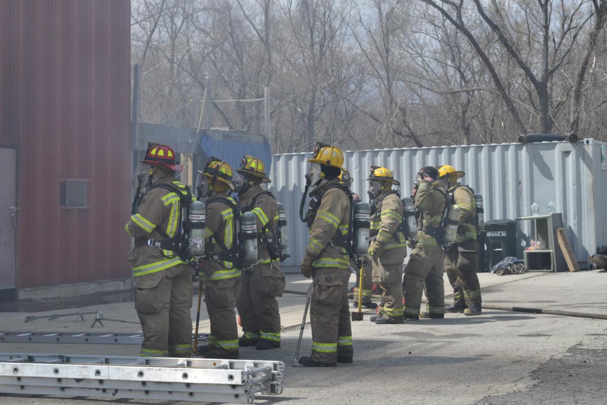 Trainee Crews Observe Another Crew Practicing a Fire Response